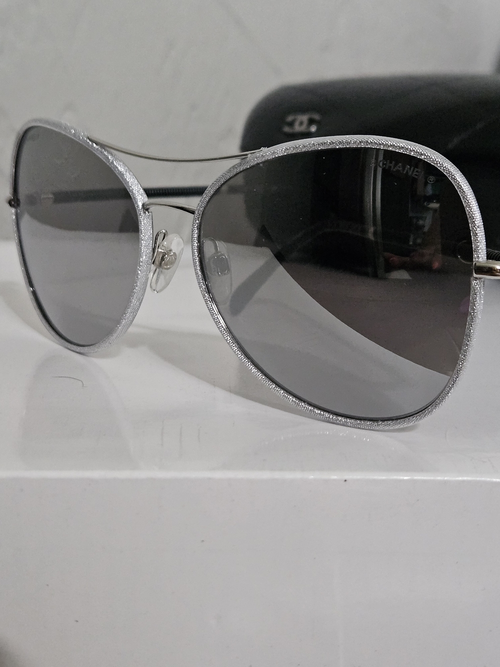 CHANEL Silver Frame Sunglasses with Gray Gradient Lenses